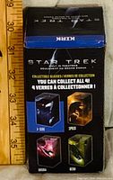 Front of retail box showing collection information
