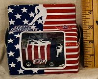 Front of boxed die-cast Zamboni with USA flag design