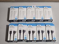All ten boxed Logiix cables lined up showing fronts with model info and quantity marker