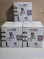 Front view of six boxed FlexView mounts showing quantity and packaging