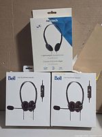 All three boxed headsets—1 Nextech, 2 Bell—group shot