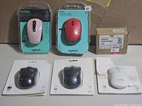 Group shot of all six wireless mice with packaging
