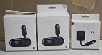 Three Vital FM transmitter boxes, two Bluetooth version and one with remote