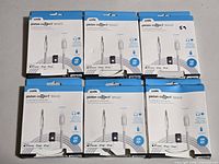 Six boxed Logiix Piston Connect Braid cables arranged for full lot view