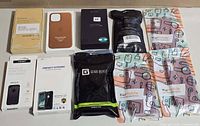 Group shot showing all ten packaged phone cases