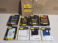 Group shot of all nine OtterBox cases showing packaging fronts