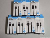 Group shot of seven boxed cables