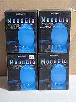 Four sealed Merkury MoodGlo lamp boxes front view