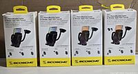 Four boxed Scosche 4-in-1 phone mounting systems front view