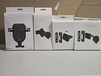 Four Vital phone mount boxes front view