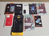 Group shot of all nine packaged phone accessories