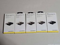 Five Scosche Strikeline adapter boxes front view