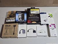 All ten packaged cables and adapters laid out for overview