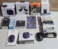 All 14 retail packaged items laid out on table