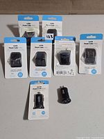 Group shot of all eight chargers, packaged and loose