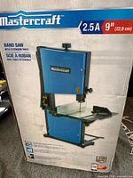 Front of unopened Mastercraft band saw box showing product image and key specs