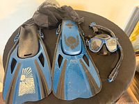group view of fins, mask, snorkel and mesh bag