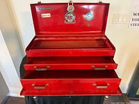 toolbox open showing drawers and interior tray