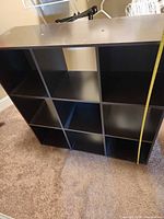 Front view of nine-cube shelf showing overall structure
