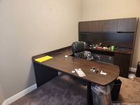 Overall view of L-shaped desk, hutch, chair and accessories