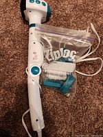 massager with cord and attachments bag