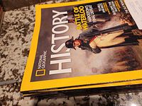 Stack of National Geographic History magazines showing top cover (Battle of Waterloo)