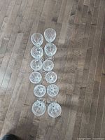 Top-down view showing all 12 glasses and base cut pattern