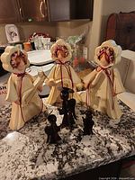Group shot of all six angel figurines on countertop