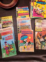 Stacks of Gold Key/Whitman character comics alongside Classics Illustrated issues