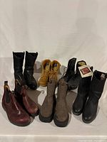 Front view all six pairs boots