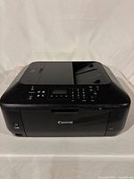 Front three-quarter view of Canon PIXMA MX450 printer