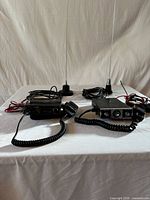 Overview of both CB radios with microphones and antennas