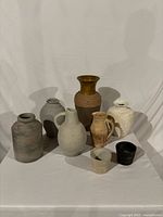 Group view of all eight ceramic vessels