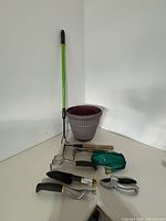 Overall view showing all garden tools and planter pot