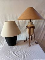 Two table lamps side by side showing bases and shades