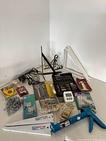 Overview of all hardware and tools spread on surface