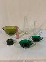 entire group of seven glass pieces on white background