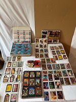 Overall view showing binder of Star Trek cards, Fright Flicks box lid and multiple grouped cards