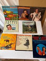 Seven vinyl record album fronts arranged for overview