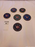 Front view of six round San Francisco Bowling Council patches