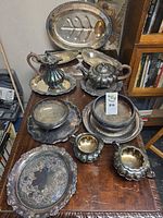 Group shot of all silverplate pieces on table