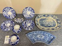 Group shot displaying all pieces in lot