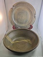 Bowl interior and platter front showing glaze and size