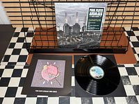 Gatefold jacket in shrink with hype sticker, lyric insert, 180g black vinyl record