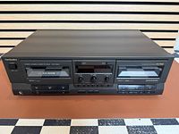 Front view of Technics RS-TR333 cassette deck, closed doors