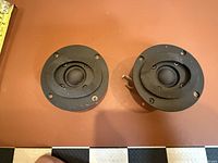 Front view of both SEAS tweeters on flat surface
