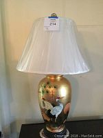 Full view of the ginger jar lamp with white fabric shade, showing size and overall appearance.