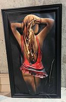 Full view of framed 3-D female figure artwork
