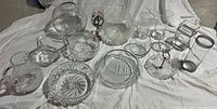 Group shot of all glass pieces laid out on cloth