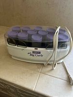Conair More Big Curls unit showing 12 purple rollers and power cord